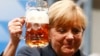 Angela Merkel, un toast după reuniunea electorală de la Dachau