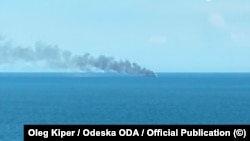 Consecințele atacului rusesc asupra unei nave de marfă în apropiere de Odesa, Ucraina, pe 14 iulie.