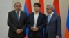 Armenia - President Serzh Sarkisian (R) and Education Minister Levon Mkrtchian (L) award a medal to Razmik Danielian, a school student charged with causing a deadly car accident, Yerevan, 29Aug2017.