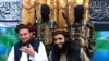 FILE: Tehrik-e Taliban Pakistan (TTP) spokesman Ehsanullah Ehsan (L) and one of the group's leaders Adnan Rasheed during a press conference in 2013.