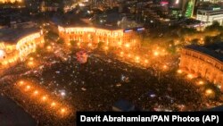 ARMENIA -- Opposition demonstrators gathered on the Republic Square celebrating Armenian Prime Minister Serzh Sarkisian's resignation in Yerevan, April 23, 2018