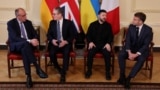 British Prime Minister Keir Starmer, Ukrainian President Volodymyr Zelenskyy, French President Emmanuel Macron, and German Chancellor Friedrich Merz meet at 10 Downing Street, in London on December 8.