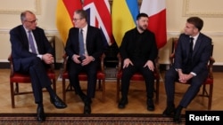 British Prime Minister Keir Starmer, Ukrainian President Volodymyr Zelenskyy, French President Emmanuel Macron, and German Chancellor Friedrich Merz meet at 10 Downing Street, in London on December 8.