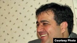 Jailed Iranian journalist Mehdi Mahmoudian