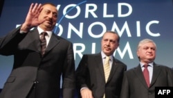 Azerbaijani President Ilham Aliyev (left) with Turkish Prime Minister Recep Tayyip Erdogan and Armenian Foreign Minister Edward Nalbandian in Davos earlier this year