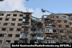 Пошкоджена російським обстрілом багатоповерхівка у Шевченківському районі Києва. Київ, 24 травня 2026 року