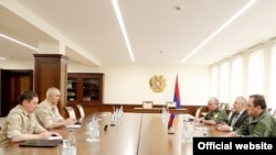 Armenia - Armenian Defense Minister Vagharshak Harutiunian meets with Rustam Muradov, commander of the Russian peacekeeping forces in Nagorno Karabakh, Yerevan, May 25, 2021.