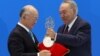 IAEA Director-General Yukiya Amano (left) and Kazakh President Nursultan Nazarbaev take part in a video link, dedicated to the opening of the Low Enriched Uranium Bank in the Kazakh city of Oskemen, in Astana on August 29. 