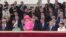 Queen Elizabeth II (center) speaks from the royal box during an event to commemorate the 75th anniversary of the D-Day landings in Portsmouth on June 5.