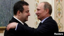 Outgoing Serbian Prime Minister Ivica Dacic (left) with Russian President Vladimir Putin. Dacic is reportedly the Kremlin's closest ally in Belgrade. 