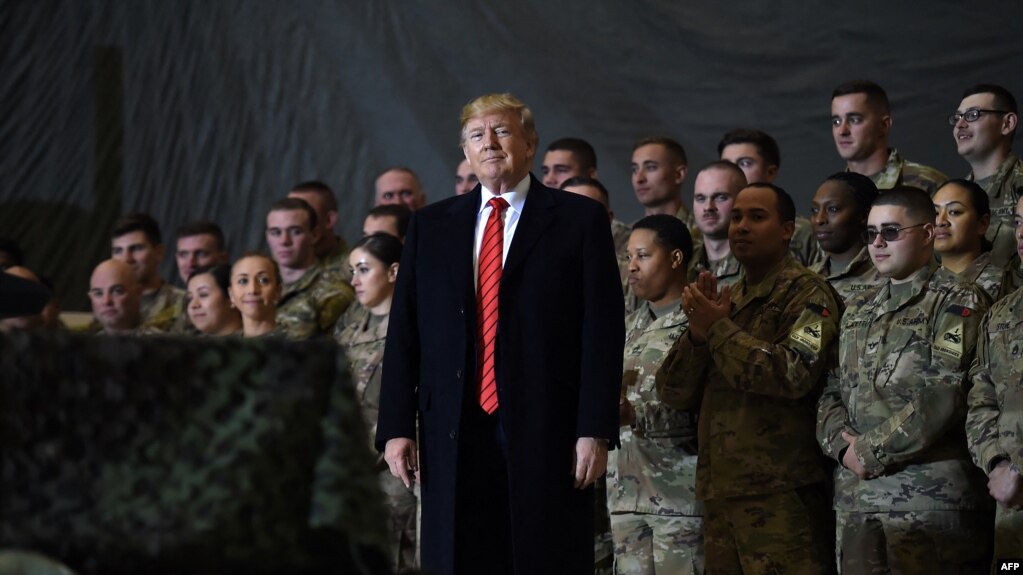 US President Donald Trump speaks to the troops during a surprise Thanksgiving day visit at Bagram airbase in 2019. 