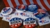 Значки и наклейки, которые американские избиратели могли приколоть на грудь, проголосовав за одного из кандидатов.