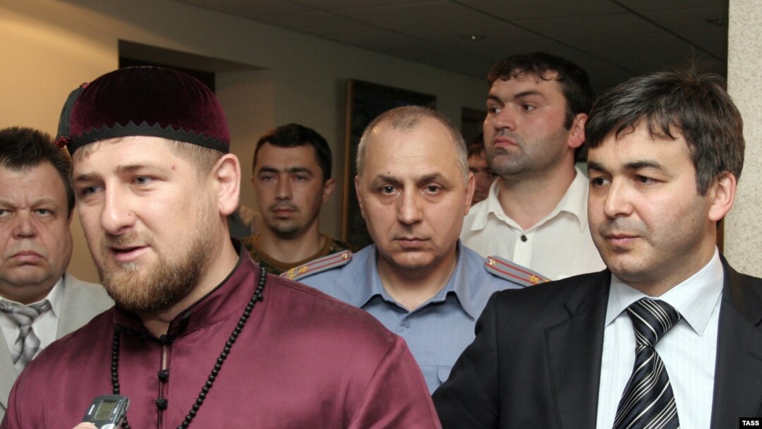 Chechen leader Ramzan Kadyrov at a June meeting with Ingushetia's acting President Rashid Gaysanov (right)