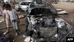 Իրաք - Բաղդադի Սադր Սիթի թաղամասում ռմբահարումից հետո, 16-ը ապրիլի,, 2012թ.