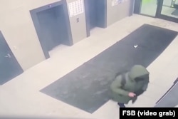 A screengrab of CCTV footage released by Russia's FSB security agency via TASS shows an alleged suspect in a shooting attack on GRU Lieutenant General Vladimir Alekseyev.