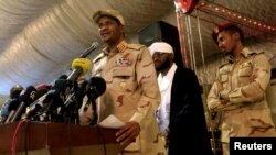 FILE PHOTO: General Mohamed Hamdan Dagalo, head of the Rapid Support Forces (RSF) and deputy head of the Transitional Military Council (TMC) delivers an address after the Ramadan prayers and Iftar organized by Sultan of Darfur Ahmed Hussain in Khartoum, S