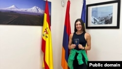 Russia-born Armenian tennis player Elina Avanesyan showing her Armenian passport