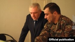 Armenian Defense Minister Vagharshak Harutiunian (left) and Karabakh army commander Mikael Arzumanian, December 3, 2020.