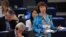 European Union foreign-policy chief Catherine Ashton (right) addresses members of the European Parliament as part of a plenary session in Strasbourg on September 11.