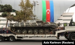 Equipment captured from Armenian forces was also paraded, such as this armored personnel carrier (APC).