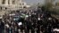 Iranian protesters chant slogans at a rally in Tehran last month.