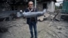 An unexploded rocket is seen near a graveyard in a town in Nagorno-Karabakh on October 1. 