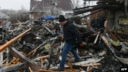 Video shows Ukrainian council member throw grenades at village meeting;  dozens injured