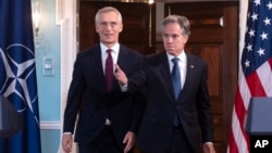 NATO Secretary-General Jens Stoltenberg (left) and Secretary of State Antony Blinken arrive for a news conference at the State Department in Washington on June 18. 