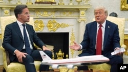 Марк Рутэ і Дональд Трамп.