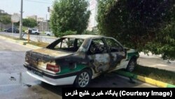 یک دستگاه خودروی پلیس در ناآرامی‌های بند نخل تقی در عسلویه، به آتش کشیده شد