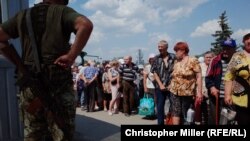 So far this year, at least 29 civilians have died while making the journey through the five checkpoints along the 400-kilometer-long front, including 10 in Stanytsya Luhanska.