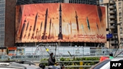 Billboards across Tehran on April 15 blasted Israel and praised Iran's capabilities as world leaders urged a de-escalation of tensions between the archenemies. 
