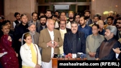 FILE: Former Balochistan lawmakers talking to journalists.