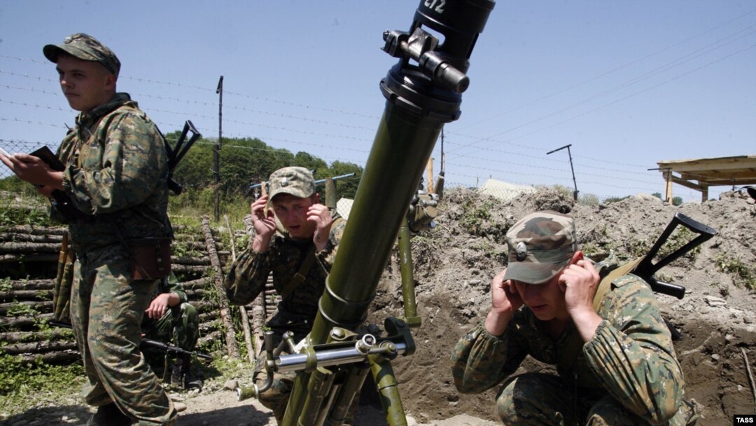 Artillery practice at Ingur frontier post, where Russian border guards have been deployed to defend Abkhazia's border with Georgia