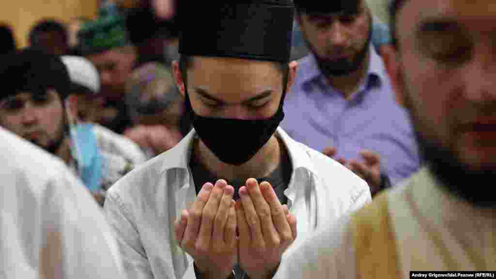 A man praying at the Gadel Mosque in Kazan.