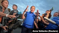 IAEA Director-General Rafael Grossi speaks with journalists after he and a part of the IAEA mission came back from the Zaporizhzhya nuclear power plant at a Ukrainian checkpoint in the Zaporizhzhya region on September 1.