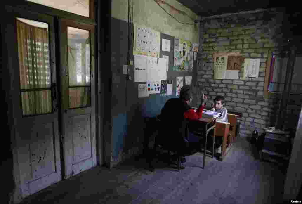 A one-on-one lesson with his teacher, who studied here when she was a child.