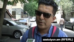 Armenia -- An Iranian man talks to RFE/RL's Armenian Service about Iran's historic nuclear deal, Yerevan, 15 Jul, 2015