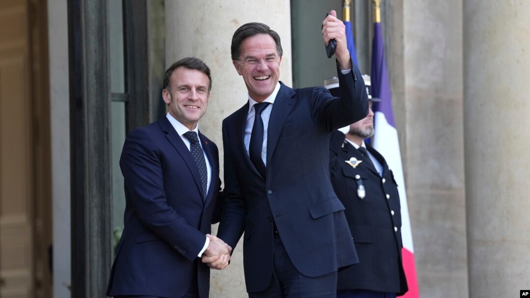 Emmanuel Makron və Mark Rütte