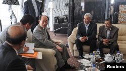 Kim Yong Nam (third from left), chairman of the Presidium of the Supreme People's Assembly of North Korea, attends a meeting with officials at the Nonaligned Movement summit in Tehran on August 29.