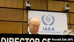 Director General of the International Atomic Energy Agency, IAEA, Yukiya Amano of Japan, waits for the start of the IAEA board of governors meeting at the International Center in Vienna, June 4, 2018