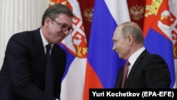 Russian President Vladimir Putin (right) and Serbian President Aleksandar Vucic (file photo)