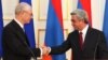 Armenia - President Serzh Sarkisian (R) and European Union President Herman Van Rompuy shake hands at a joint news conference in Yerevan, 4Jul2012.