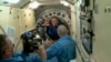 Космонавты на борту МКС 14 октября