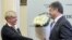 Тодішні голова Національного банку України Валерія Гонтарева і президент України Петро Порошенко під час зустрічі в НБУ, 2014 рік
