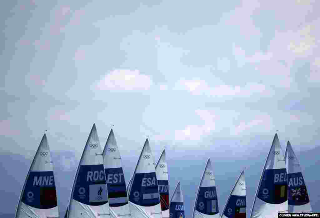 Laser class sailor fleet in action during a training session for the Tokyo 2020 Olympic Games in Enoshima, Japan, 24 July 2021.