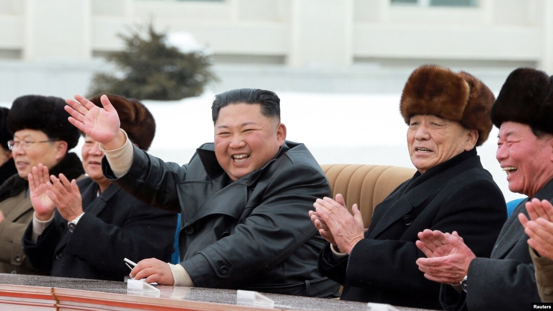 Kim Jong Un (u sredini), fotoarhiv