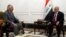 US Secretary of State Rex Tillerson (left) meets with Iraqi Prime Minister Haidar al-Abadi in Baghdad on October 23.