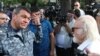 Armenia - Vladimir Gasparian (L), the chief of the Armenian police, argues with a protester in Yerevan, 26Jun2015.