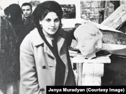 Jenya Muradian with an early version of the face of Yerevan's Mother Armenia monument